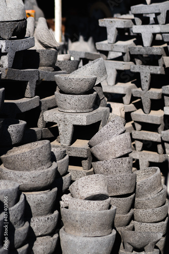 Molcajetes y metates de piedra volcánica a la venta en Puebla México photo