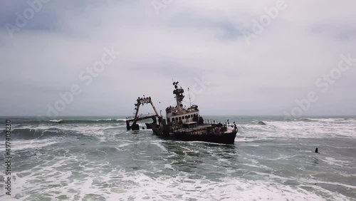 Sunken trawler, shipwreck. Old rusty metal ship Zeila at Skeleton Coast Namibia.
