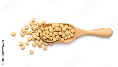 Flat lay of Soybeans in wooden scoop isolated on white background.