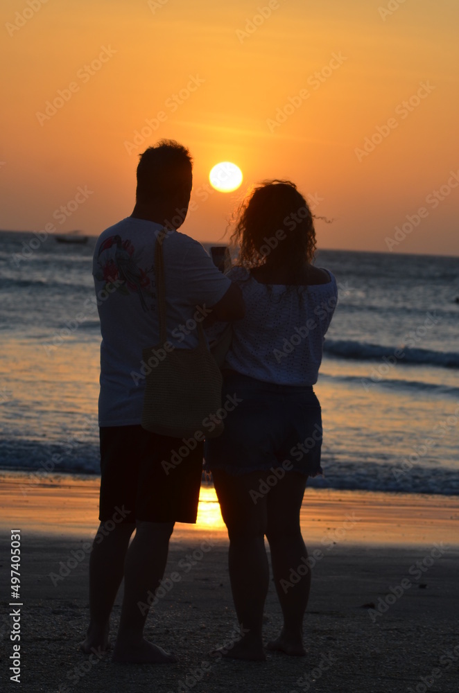 Sunsets awesome, different persons taking selfie pic outside, lifestyle happiness in couple