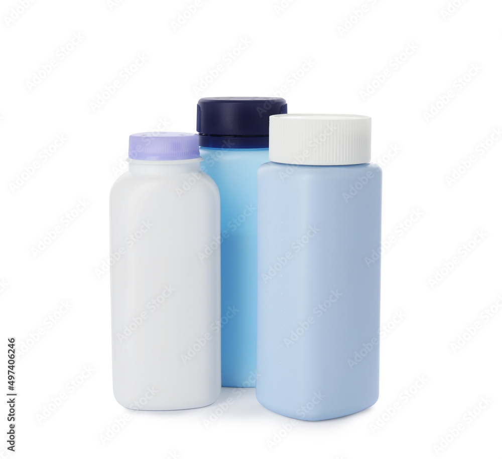 Bottles of dusting powder on white background, space for design. Baby cosmetic product Bottles of dusting powder on white background, space for design. Baby cosmetic product