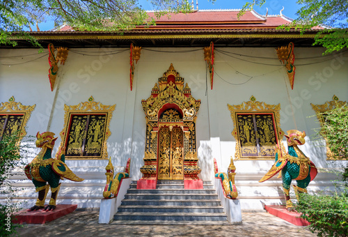 Kalasin, Thailand - -28 Feb. 2022 : full of beauty at Wat Wang Kham Temple consists of a wide range of Lan Xang architecture including Sim Thai Mueang Wang, exquisite Lan Xang ubosot in Khao Wong. photo