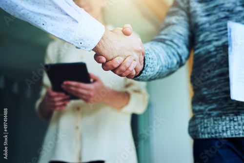 Partnering together to take over the business world. Closeup shot of unrecognizable businesspeople shaking hands in an office.