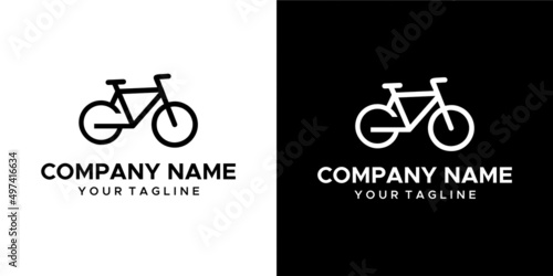 graphic image of a bicycle themed with tires forming a GO. on a black and white background. basic vector graphics.