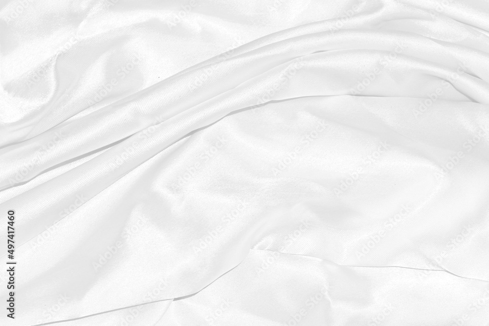 Fototapeta premium Closeup elegant crumpled of white silk fabric cloth background and texture