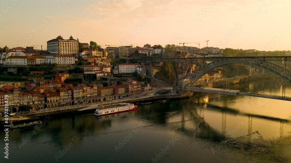 Dom Luis Bridge At The Coastal City Of Porto During Sunrise In Portugal. Pan Left Shot Dom Luis Bridge At The Coastal City Of Porto During Sunrise In Portugal. Pan Left Shot