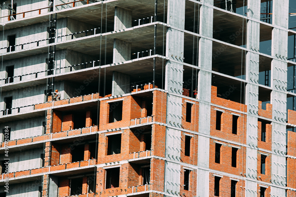 fragment of a high-rise residential and office building under construction fragment of a high-rise residential and office building under construction