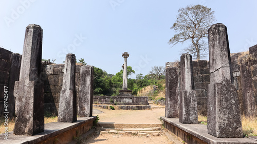 The Ruin Fortifications and Vijaya Stone Pillar of Kavaledurga Fort, Shimoga, Karnataka, India photo