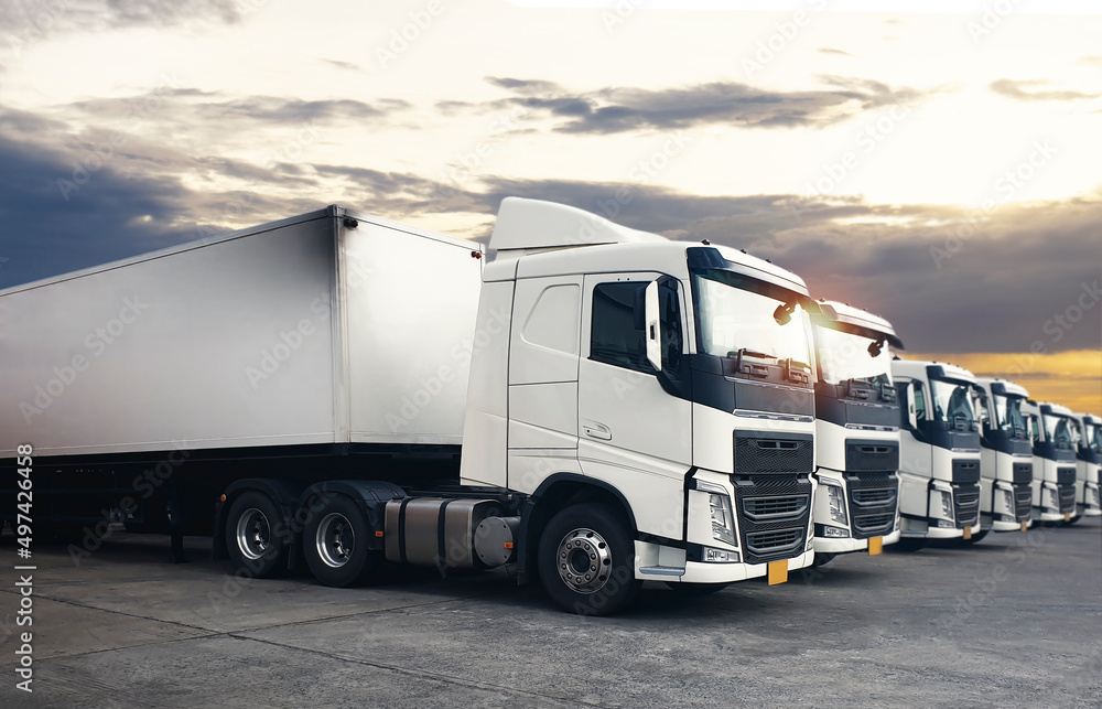 Semi Trailer Trucks The Parking Lot with Sunset Sky. Diesel Truck. Shipping Container Freight Trucks. Lorry. Trucks Logistics Cargo Transport.
Semi Trailer Trucks The Parking Lot with Sunset Sky. Diesel Truck. Shipping Container Freight Trucks. Lorry. Trucks Logistics Cargo Transport.