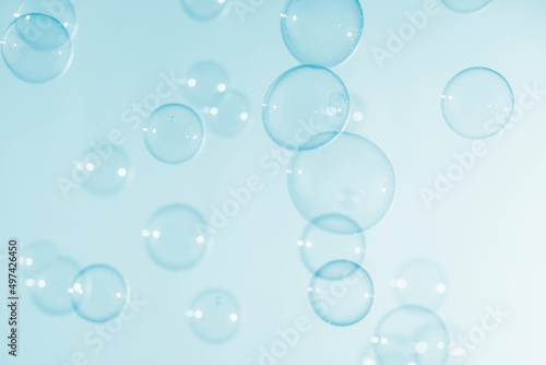 Transparent Blue Soap Bubbles Background. Soap Suds Bubbles Water 