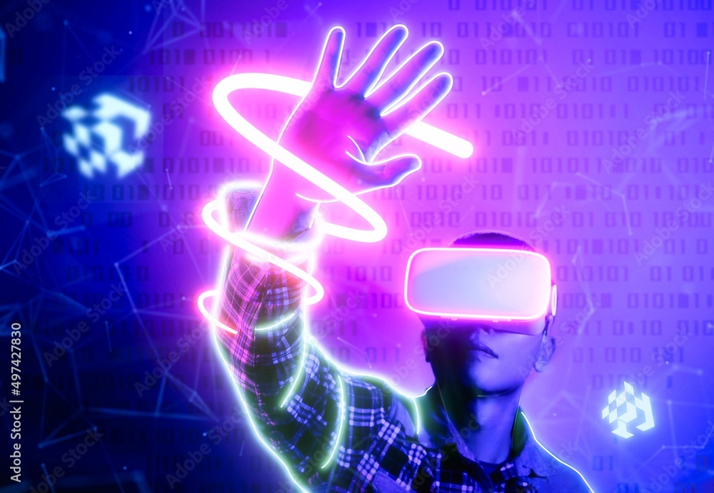 Asian man wearing virtual reality goggles, Future technology concept. Asian man wearing virtual reality goggles, Future technology concept.