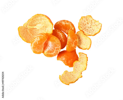 Open tangerine with slices and peel isolated photo