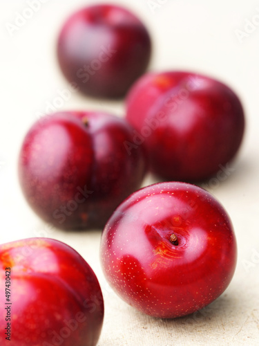 sweet, juicy plums on a white background