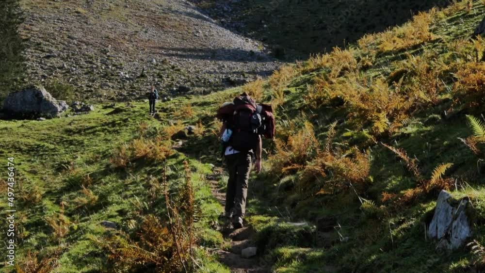 Backpackers trekking in the mountain Backpackers trekking in the mountain