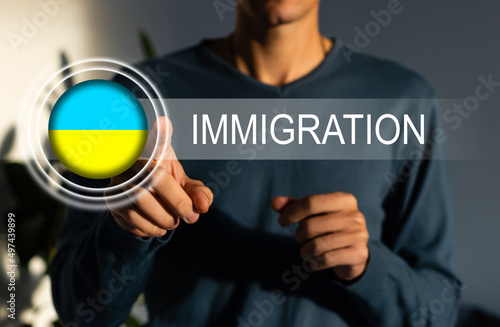 flag of ukraine and the inscription immigration, virtual button