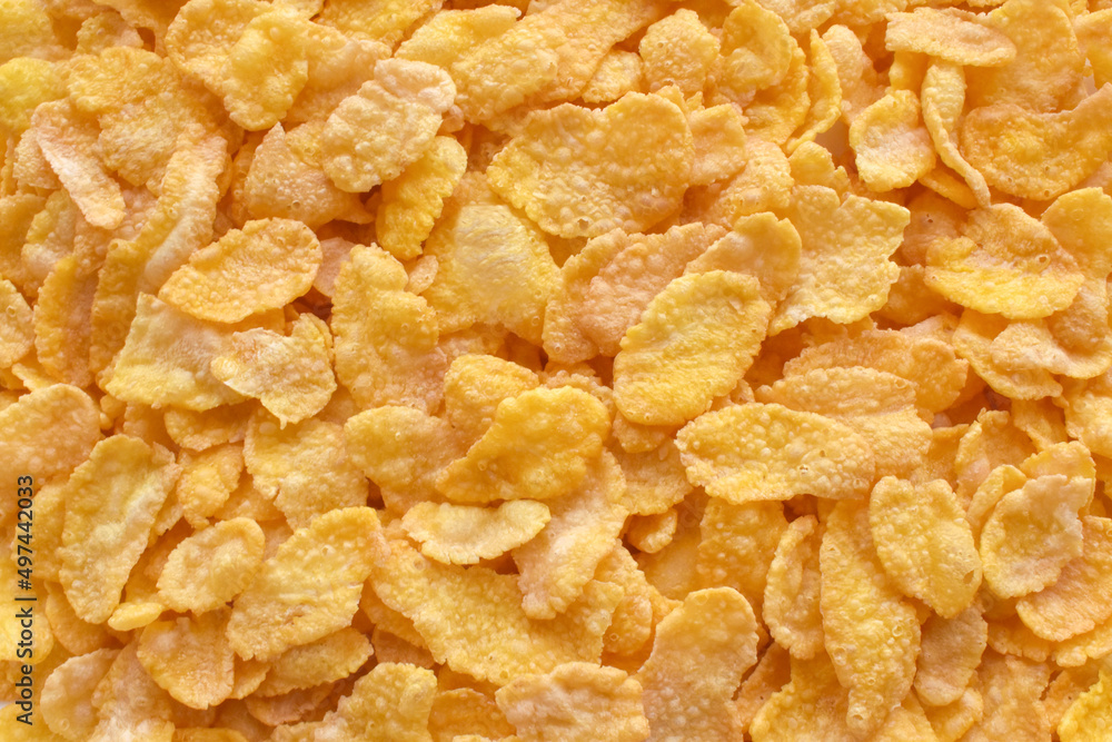 Cornflakes texture background. Heathy breakfast. Crunchy cereal background. Cornflakes texture background. Heathy breakfast. Crunchy cereal background.