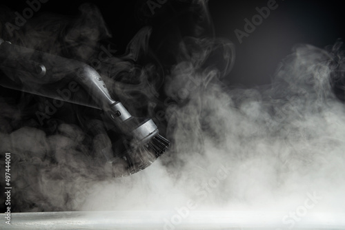 steam cleaning oven house cleaning hand close-up.