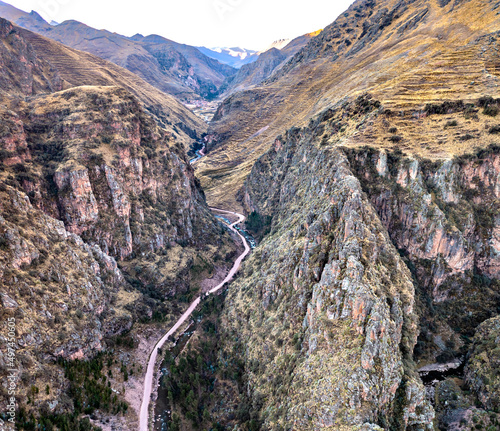 Deep canyon between Vinicunca and Palccoyo Rainbow Mountains in the Andes of Peru photo