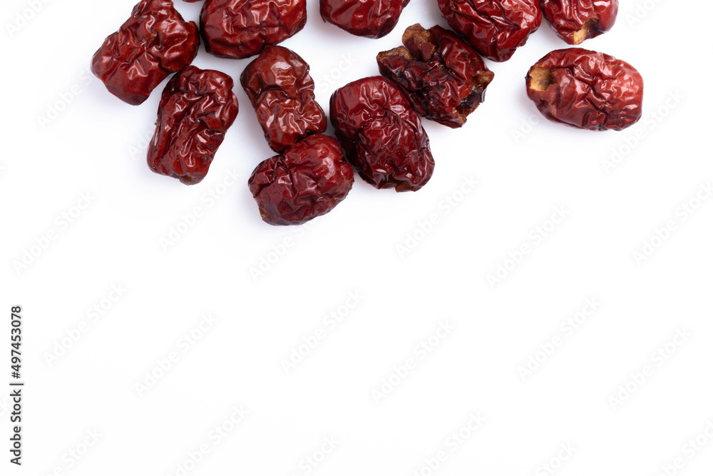Dried Chinese jujube piled on a white background. Isolated image. Dried Chinese jujube piled on a white background. Isolated image.
