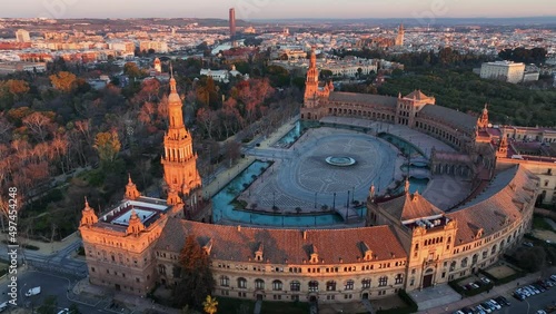 Morning view of Seville city and Plaza de Espana with Maria Luisa Park. Aerial view of Plaza de Espana - Spanish Square - at sunrise in Seville, Spain