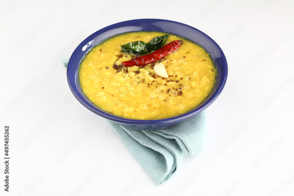 Indian food tuvar Daal or yellow lentil soup or curry in  ceramic bowl  