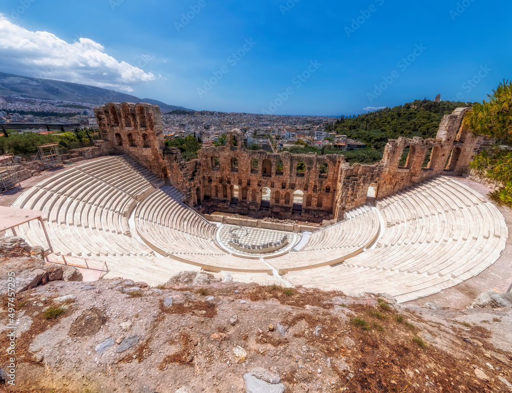 Herodion ancient theater and Athens city panoramic view under blue sky, Greece