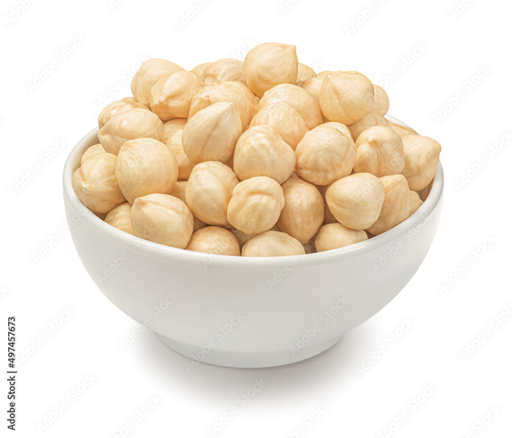 Bowl of peeled hazelnuts isolated on white background Bowl of peeled hazelnuts isolated on white background