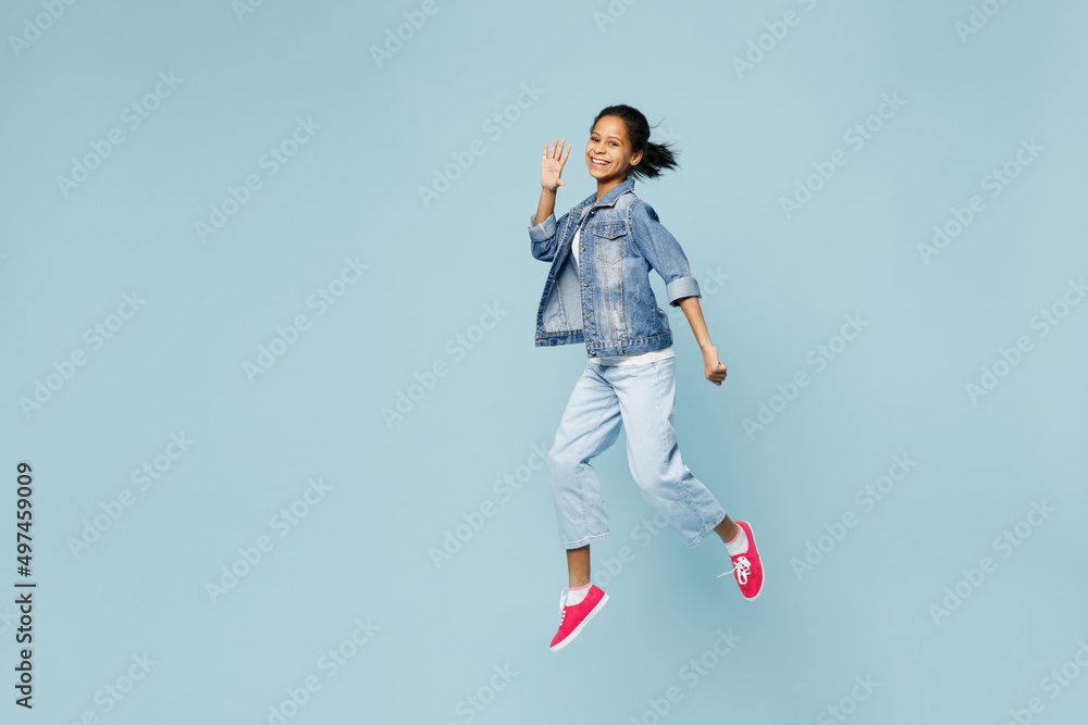 Full body happy little kid teen girl of African American ethnicity 12 ...