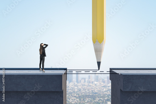 Fotobehang Thoughtful businesswoman looking at abstract pencil drawing road gap on bright sky background