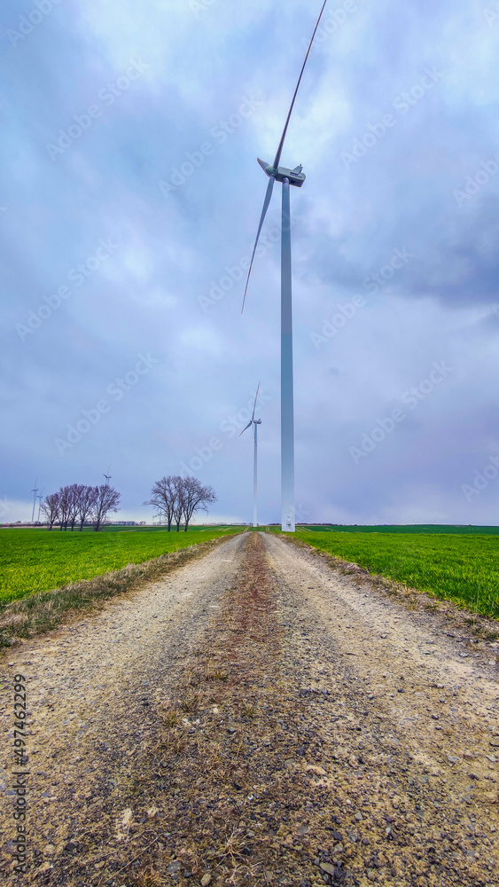 Electric wind turbine generating with blue sky and turbo generator
