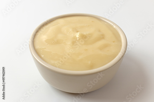 Garlic dipping sauce on white background