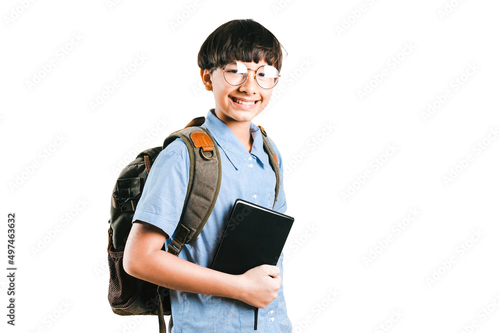 Smart preteen students wear glasses and hold notebooks or lecture book with gray backpacks while going to school or taking another class. Mix race boy smile and looks at the camera. Education Concept Smart preteen students wear glasses and hold notebooks or lecture book with gray backpacks while going to school or taking another class. Mix race boy smile and looks at the camera. Education Concept