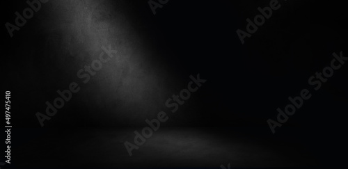Dark concrete room background. Empty three dimensional room for mock up, product display or photography backdrop.