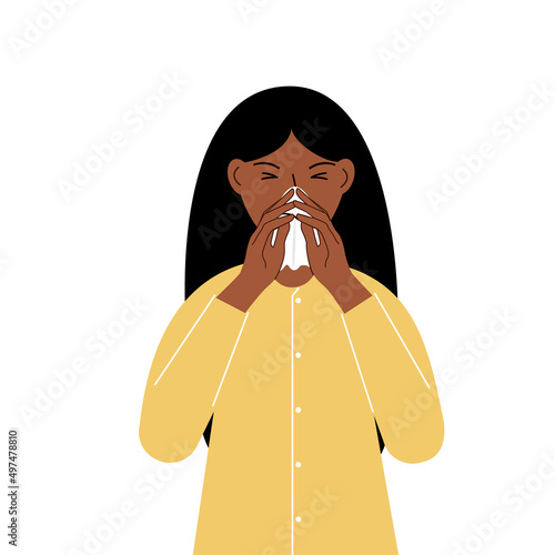 A woman covers his nose with his hands with a handkerchief. The concept of a sick person, sneezing, seasonal allergies, bad smell.