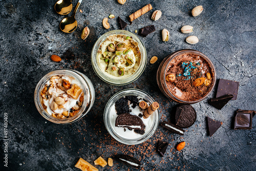Bilde på lerret Selection of gourmet flavours of Italian ice cream served in jar on dark rustic
