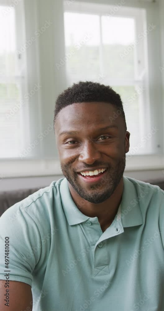 Vertical video of portrait of happy african american man Vertical video of portrait of happy african american man