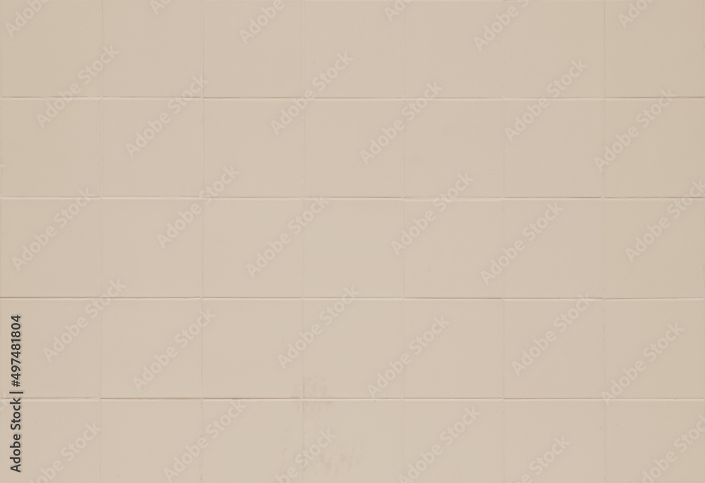 Beige ceramic wall and floor tiles mosaic abstract background. Design geometric texture decoration. Beige ceramic wall and floor tiles mosaic abstract background. Design geometric texture decoration.