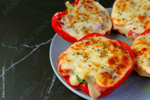 Closeup of Fresh Cooked Homemade Stuffed Bell Peppers or Dolma with Melting Cheese photo