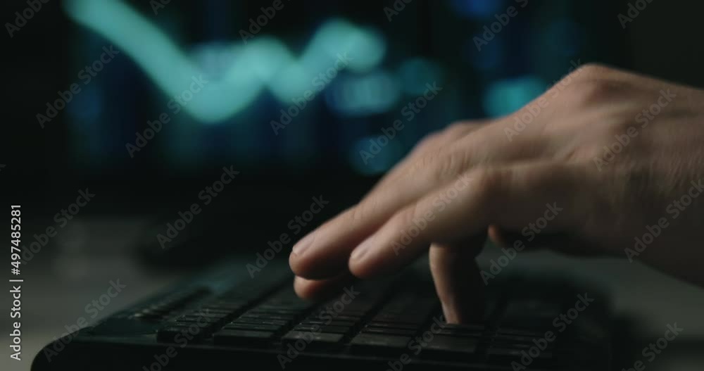 Hacker mining Non Fungible Token currency in the night Hacker mining Non Fungible Token currency in the night