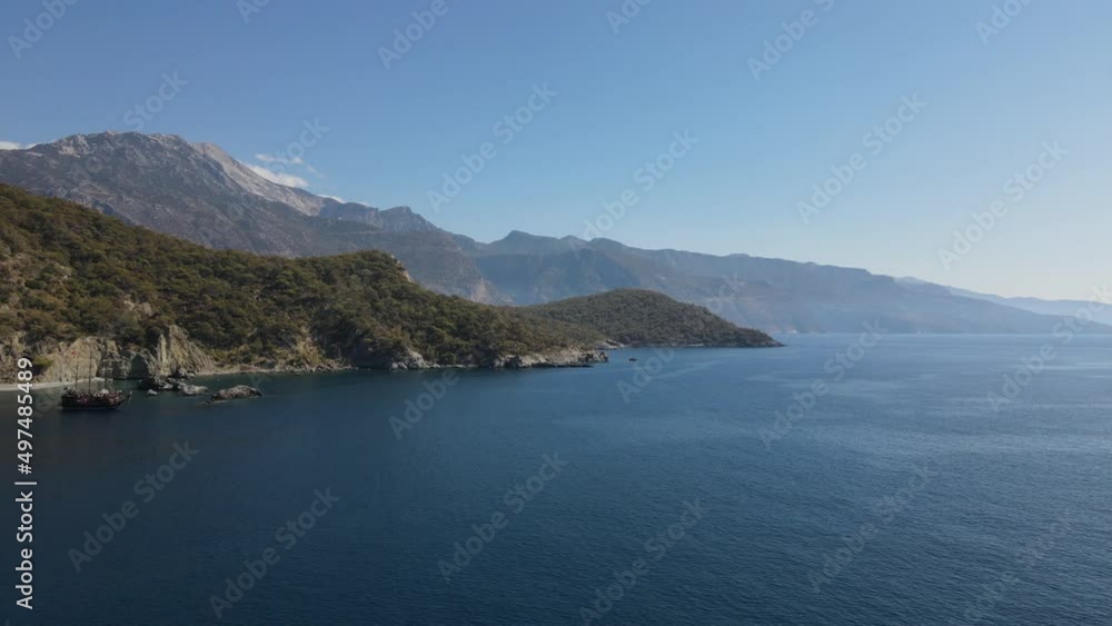 flying over the island. Landscape. Mediterranean Sea and the coast. Cyprus. City resort. Drone Point of View. Blue lagoon with rocks and stones. Mountains, paradise. flying over the island. Landscape. Mediterranean Sea and the coast. Cyprus. City resort. Drone Point of View. Blue lagoon with rocks and stones. Mountains, paradise.