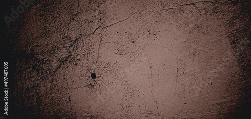 Wall full of scratches. Grungy cement texture for background  Scary dark wall.Black wall