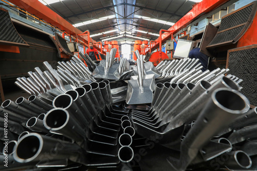 workers work hard on the steel shovel production line in a hardware tool manufacturing enterprise, North China