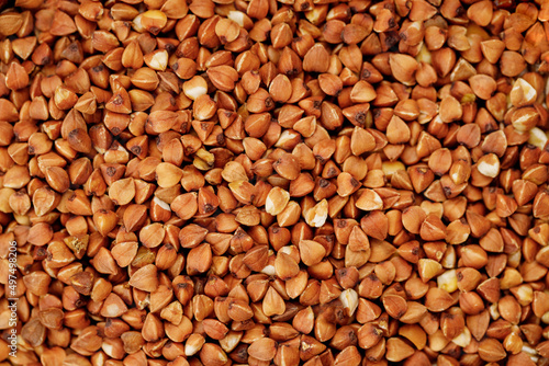 Buckwheat groats texture background. High quality photo