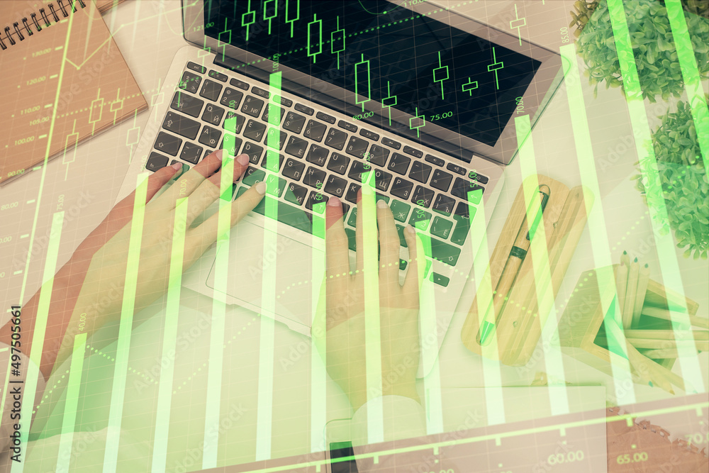 Double exposure of woman hands working on computer and forex chart hologram drawing. Top View. Financial analysis concept. Double exposure of woman hands working on computer and forex chart hologram drawing. Top View. Financial analysis concept.