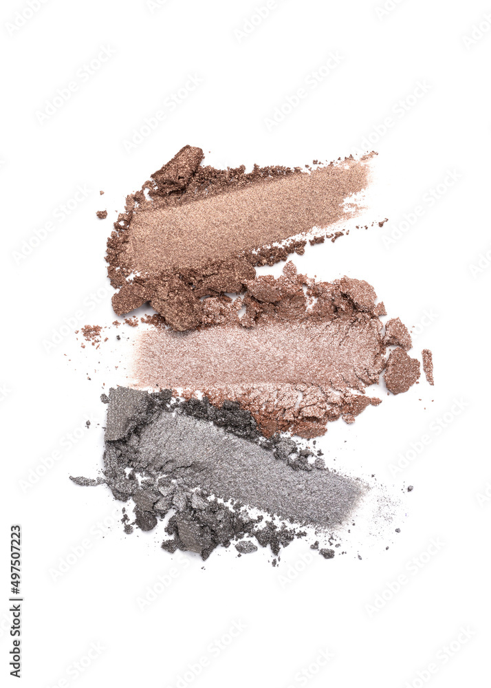 Close-up of make-up swatches. Smears of crushed grey and brown eye shadow Close-up of make-up swatches. Smears of crushed grey and brown eye shadow