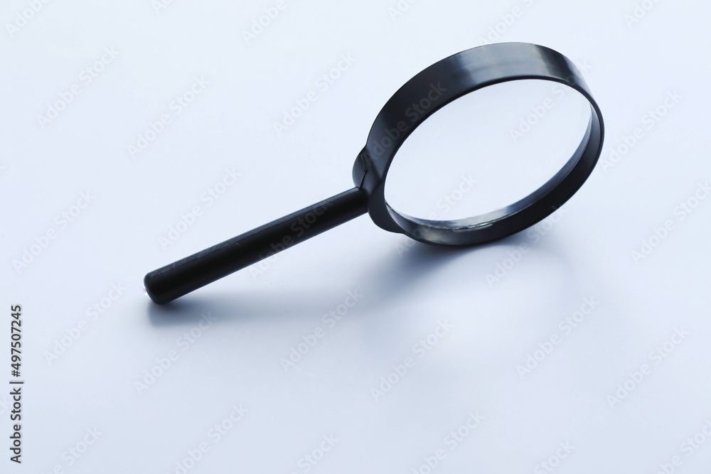 Magnifying glass round isolated on white background closeup. Magnifying glass round isolated on white background closeup.