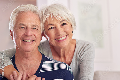 Shes my happily ever after. Portrait of a happy senior couple at home. photo