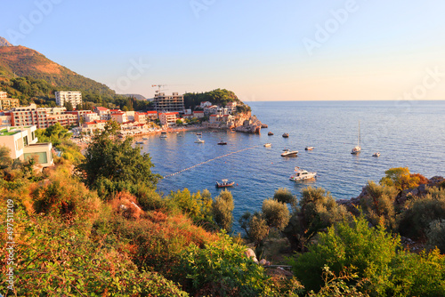 Picturesque coast in the area between Budva and Sveti Stefan at sunset in Montenegro