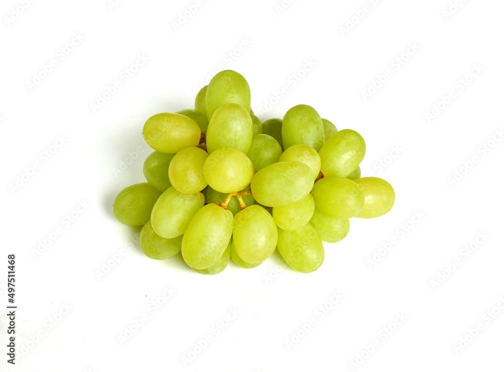 Close up of green grapes with grape leaves isolated on white background.