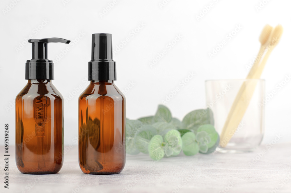 Cosmetic bottles in the bathroom. Skin care product, after shower moisturizer, skin moisturizing lotion Cosmetic bottles in the bathroom. Skin care product, after shower moisturizer, skin moisturizing lotion